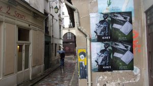 Affiche en sauvage wild posting pour la marque KART à Paris dans le Marais