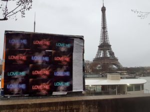 « Love Me » flyposting for Emmanuelle Zysman during Paris Fashion Week near the Eiffel Tower
